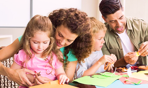 Family engaged in creative activity together